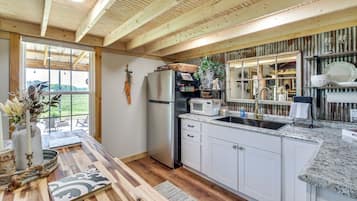 Fridge, microwave, coffee/tea maker, toaster