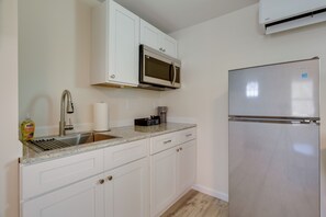 Fridge, microwave, coffee/tea maker, toaster