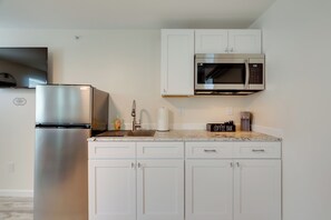 Fridge, microwave, coffee/tea maker, toaster