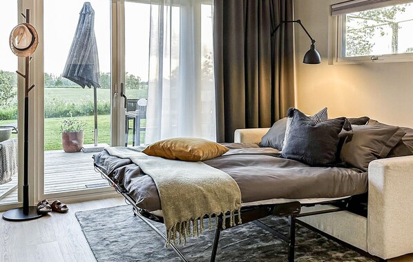 1 slaapkamer, een strijkplank/strijkijzer, reisbedje, gratis wifi