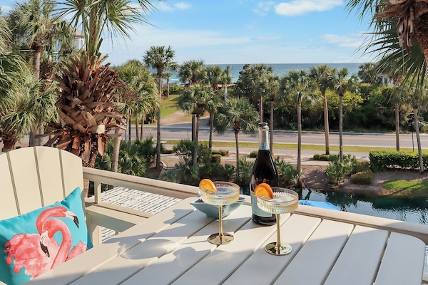 Enjoy your favorite cocktails on the balcony as you gaze upon the emerald waters