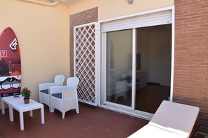 Terrace/patio - Penthouse overlooking the rooftops of Anzio's historic buildings, downtown but within walking distance of the beach. (anzio)