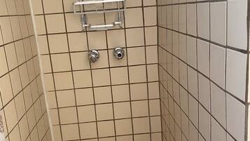 Shower, towels, soap, toilet paper