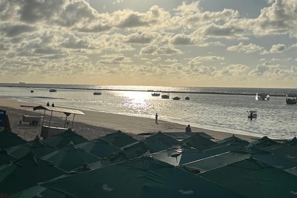 En la playa, arena blanca