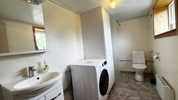 Regadera y secadora de cabello