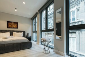 Elite Condo, Sea View | 1 bedroom, in-room safe, blackout drapes, iron/ironing board