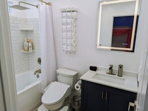 Hair dryer, bidet, towels, soap