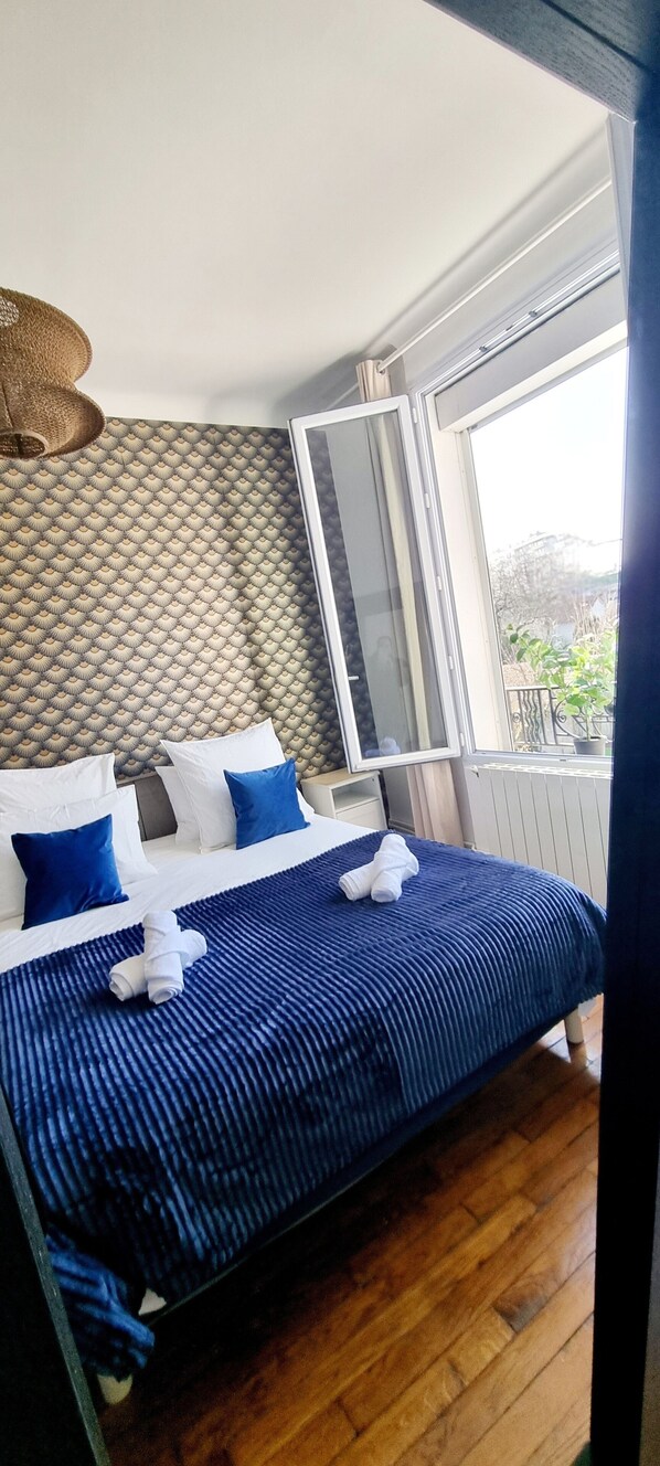 1 bedroom, desk, iron/ironing board, travel crib