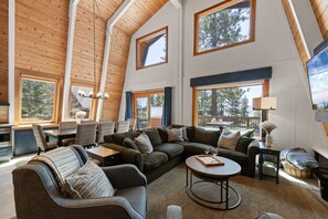 Smart TV, fireplace, books, printers