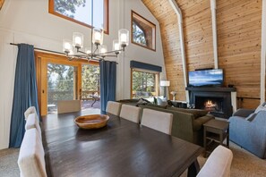 Smart TV, fireplace, books, printers