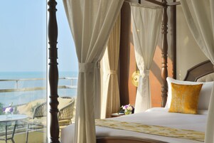 Premium Suite | Living area | 42-inch flat-screen TV with satellite channels