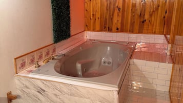 Jetted bath, towels, soap, shampoo