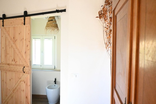 Regadera, bidet, toallas