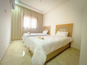 2 bedrooms, iron/ironing board, WiFi, bed sheets