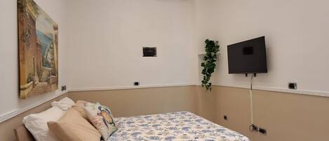 2 chambres, fer et planche à repasser, lit parapluie, Wi-Fi gratuit