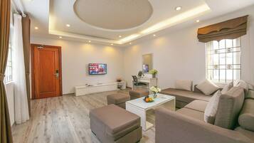 Family Suite, Balcony | In-room safe, desk, laptop workspace, soundproofing