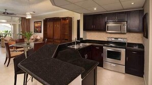 Studio Suite, Kitchen, Poolside | Private kitchen | High chair - Presidential Suites by Lifestyles  (Puerto Plata)