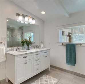 Shower, hair dryer, towels, soap