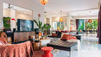 65-inch Smart TV with digital channels, foosball