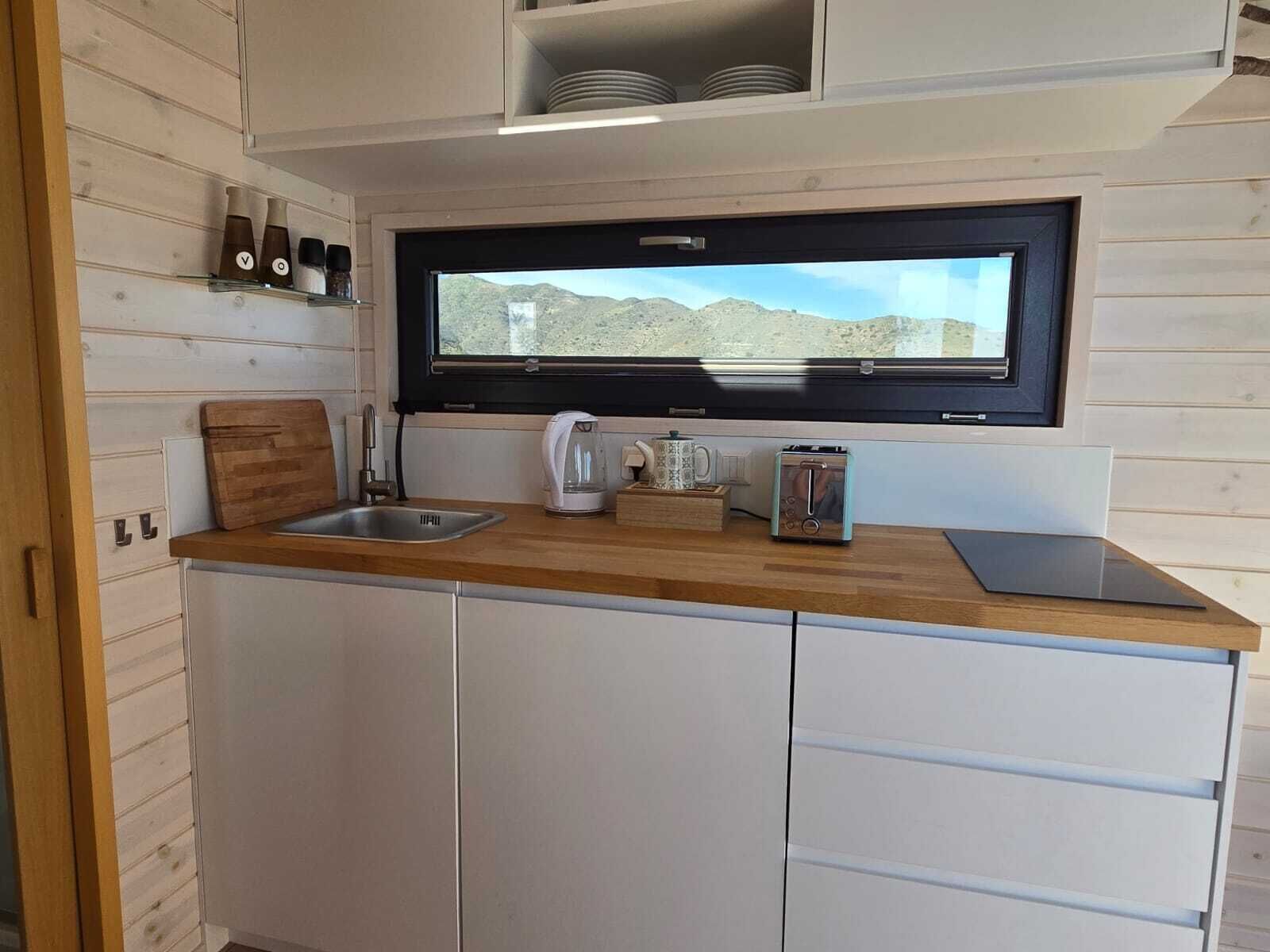 Fridge, stovetop, coffee/tea maker, toaster