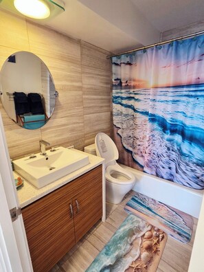 Hair dryer, towels, soap, shampoo