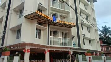 A multi-story building with a sign reading "St. Bridget's Residency."