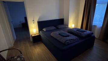 4 bedrooms, iron/ironing board, travel cot, WiFi