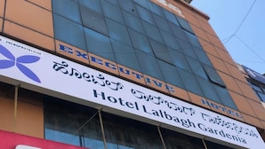 A hotel with a sign indicating it is an executive hotel. - Hotel Lalbagh Gardenia (Bengaluru)