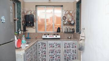 Full-size fridge, microwave, stovetop, electric kettle