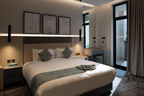 Three-Bedroom Apartment | Iron/ironing board, free WiFi