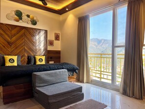 Superior Triple Room with Balcony and Mountain View x A Block | Blackout drapes, soundproofing, iron/ironing board, free WiFi - The Hosteller Rishikesh, Upper Tapovan (Uttarakhand)