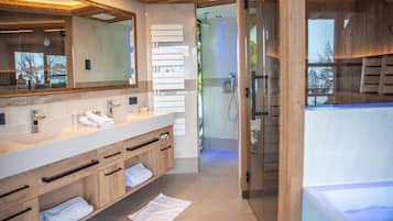 Suite | Bathroom | Hair dryer, bathrobes, towels, toilet paper