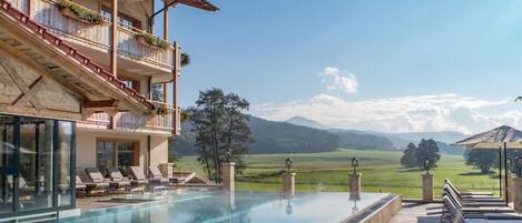 Outdoor pool, pool umbrellas, sun loungers