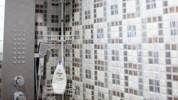Shower, hair dryer, towels, soap