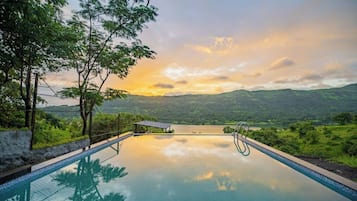 Outdoor pool, open 8:00 AM to 7:00 PM, sun loungers