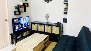TV, books - 2br Unit at Asmara near St Lukes Medical Center (Quezon City)