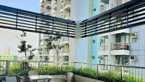Outdoor dining - 2br Unit at Asmara near St Lukes Medical Center (Quezon City)