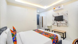 エコノミー 4 人部屋 シティビュー | バスルーム | シャワー、タオル、石鹸