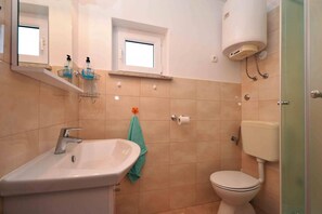 Regadera y secadora de cabello