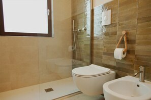 Hair dryer, bidet, towels, soap