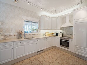 Fridge, oven, dining tables