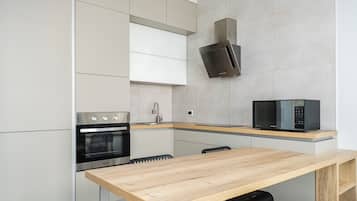 Departamento Confort, vista a la ciudad | Cocina privada