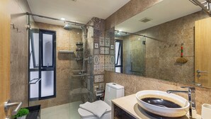 A modern bathroom with a glass shower enclosure, a large mirror, and a vessel sink. - One bedroom Condo in Title V Rawai 410 (Rawai)