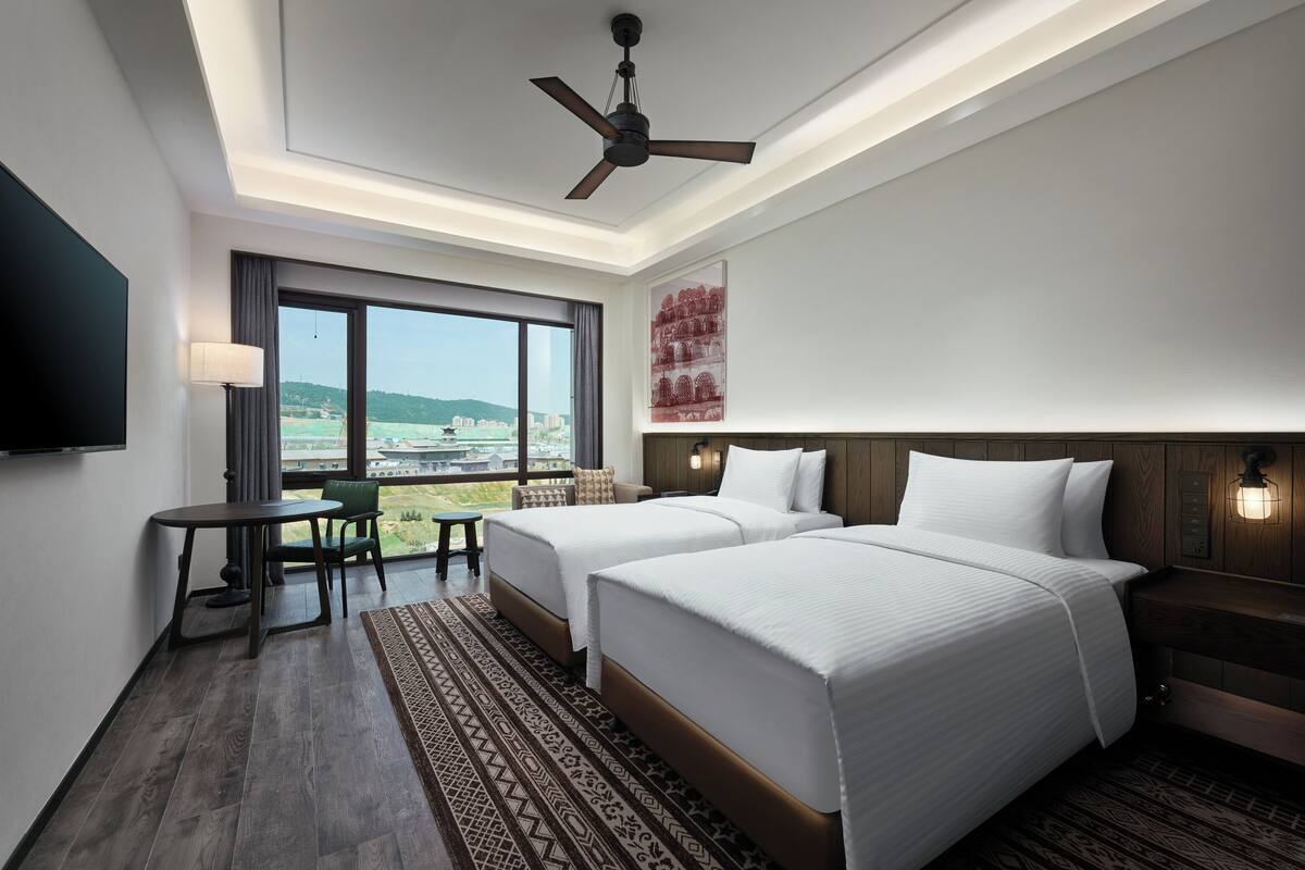 Desk, iron/ironing board, rollaway beds, bed sheets