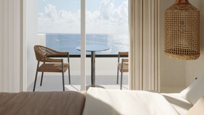 A hotel room with a large window, a balcony with wicker chairs, a round table, and a woven light fixture. - néreya luxury rooms (Rhodes)