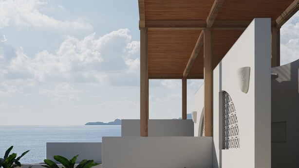 A modern outdoor seating area with a sofa, a small round table, and a hot tub, overlooking a body of water. - néreya luxury rooms (Rhodes)