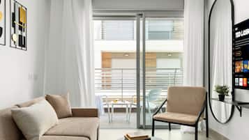 Apartment | Living area | 55-inch Smart TV with cable channels