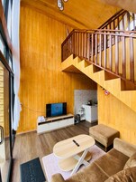 Habitación familiar, vistas a la montaña | Zona de estar