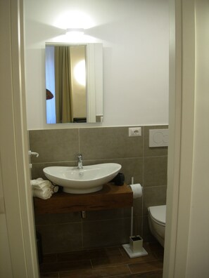 Hair dryer, bidet, towels, soap