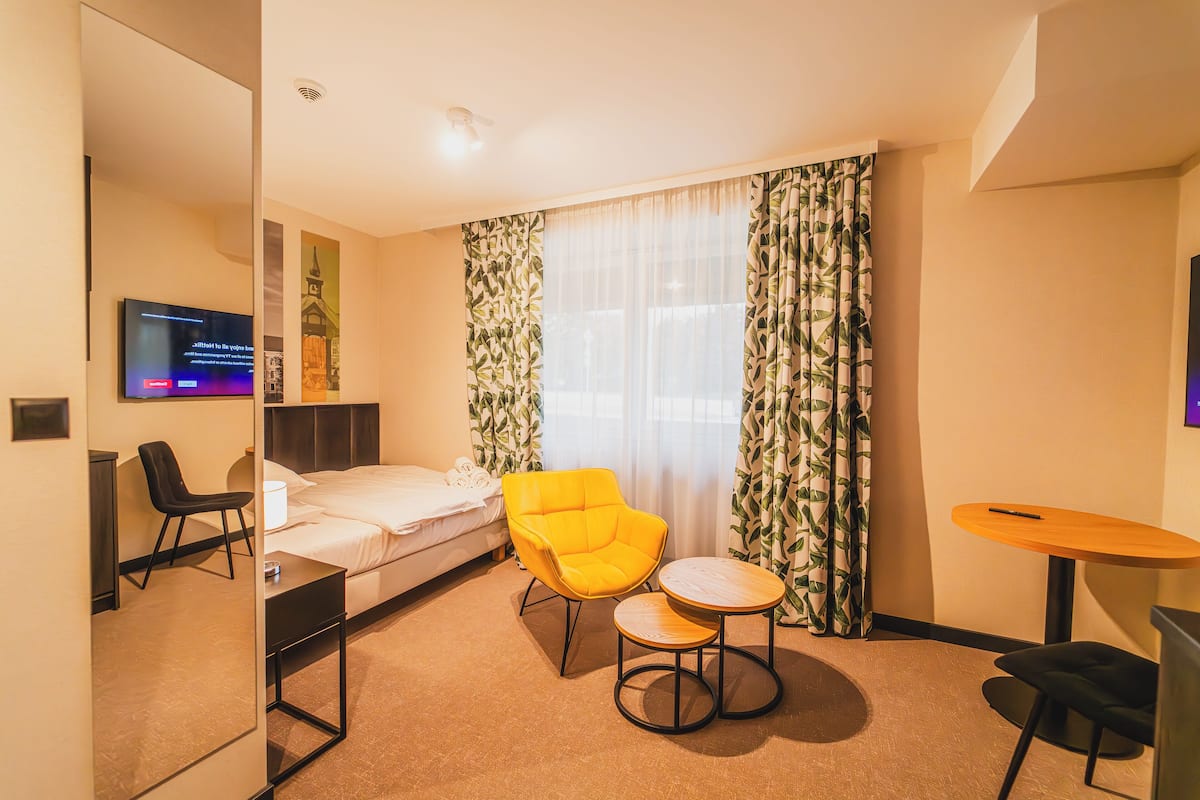 Classic Single Room, City View | In-room safe, desk, iron/ironing board, free WiFi